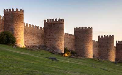 muralla-avila-noche › Legal Services Spain